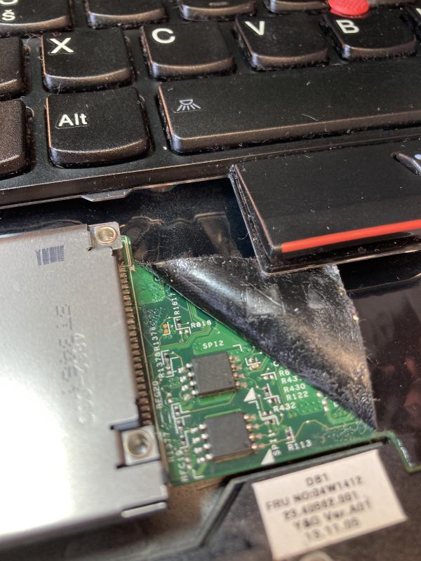 The chips that we're going to flash sit behind the left side of the palmrest, making them quite easy to access.