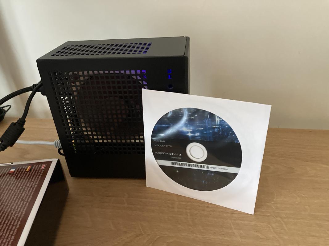 Included driver CD for scale. Not sure where you'd insert it, though.