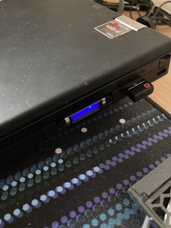 Yes, it has a blue LED that blinks.